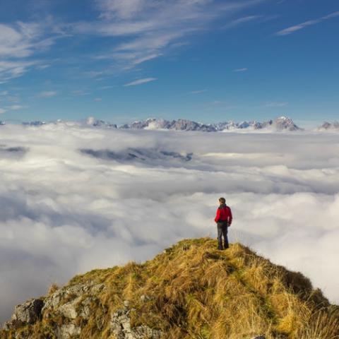 man standing on mountain